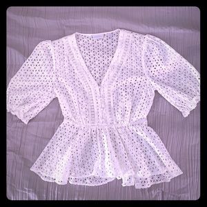 Eyelet blouse.